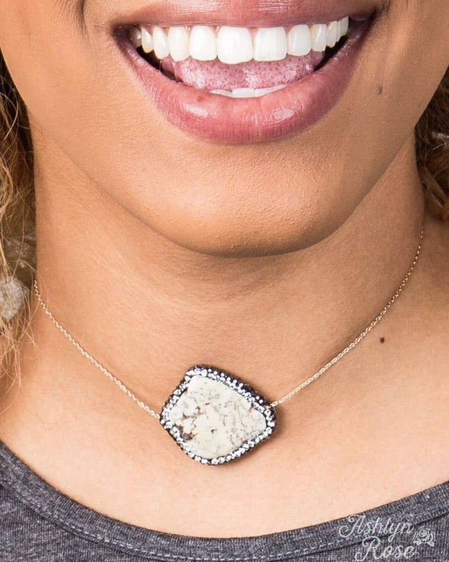 Cream Stone Pendant with Clear Crystal Accents on Gold Chain Choker