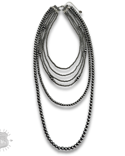 Western mixed size silver bead necklace