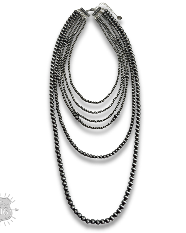 Western mixed size silver bead necklace