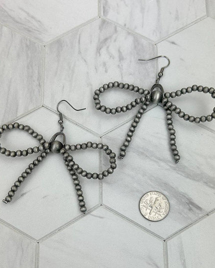 ER250309-12           Silver Navajo pearl beads bow tie Earrings