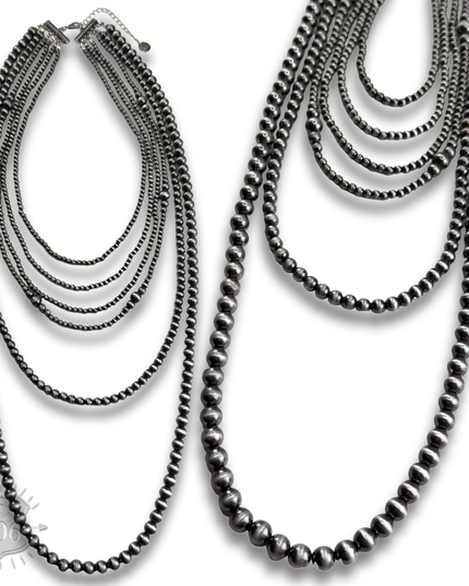 Western mixed size silver bead necklace