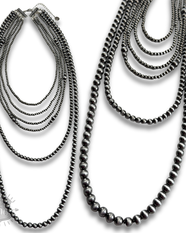 Western mixed size silver bead necklace