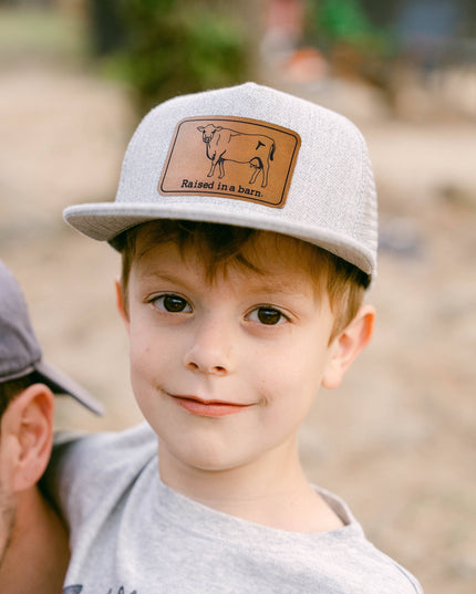 Raised in a barn Cow Country Western Farm Kids Trucker Hat