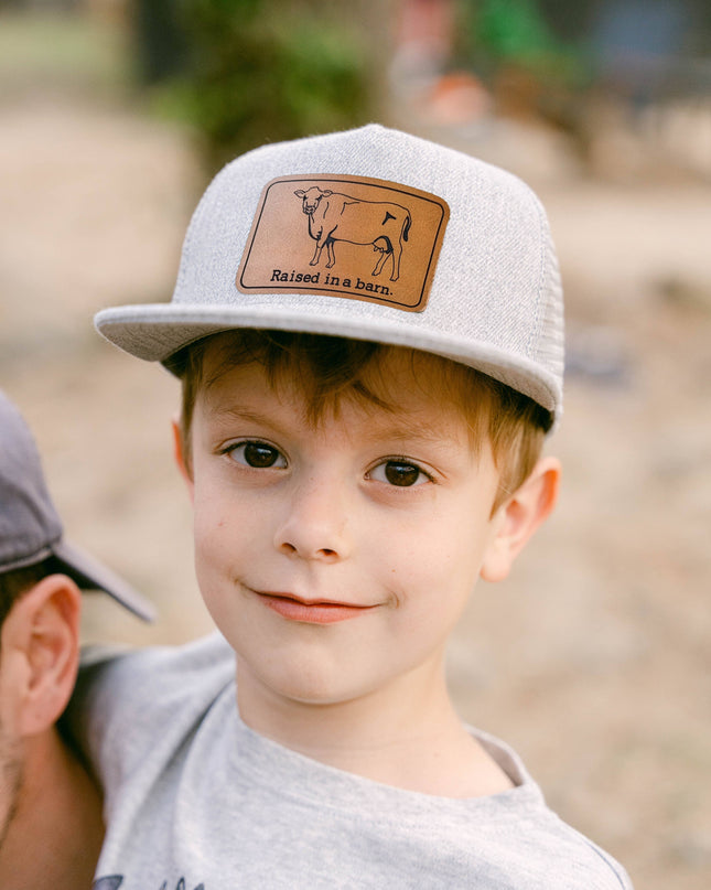 Raised in a barn Cow Country Western Farm Kids Trucker Hat