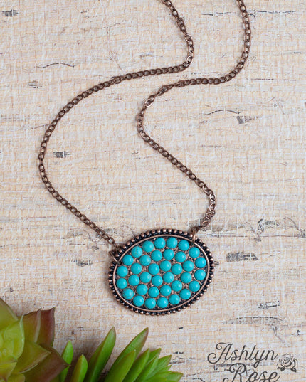 Bumpily Bamboozled Bronze Necklace With A Turquoise Pendant