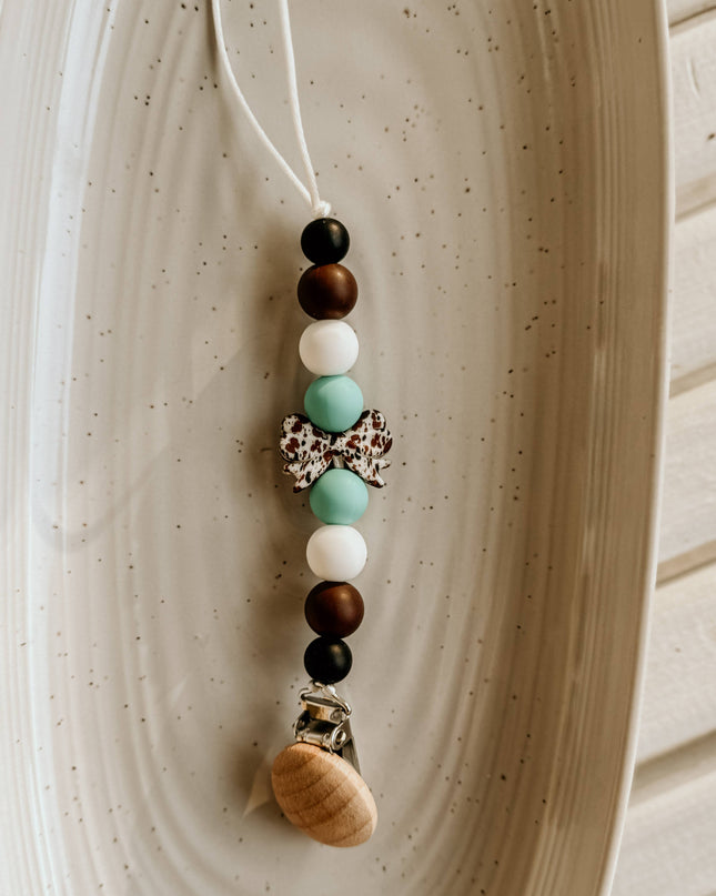 Cow Print Bow Pacifier Holder