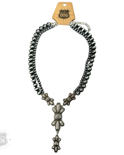 Western style pearl necklace with butterfly concho pendant