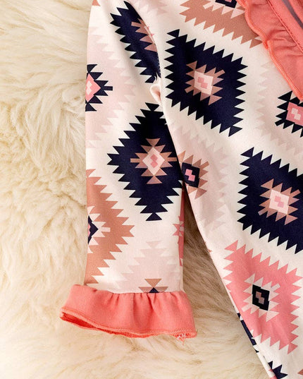 Pink aztec printed baby bodysuit w ruffle trim. RPG53246 SOL