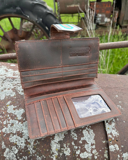 Genuine Western Cowhide Leather Purse and Wallet with jagged painted details and black fringe.