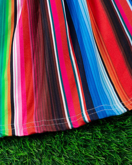 SERAPE PRINTED TUNIC WITH BLACK POM POM TRIM. TPG15113017-SO