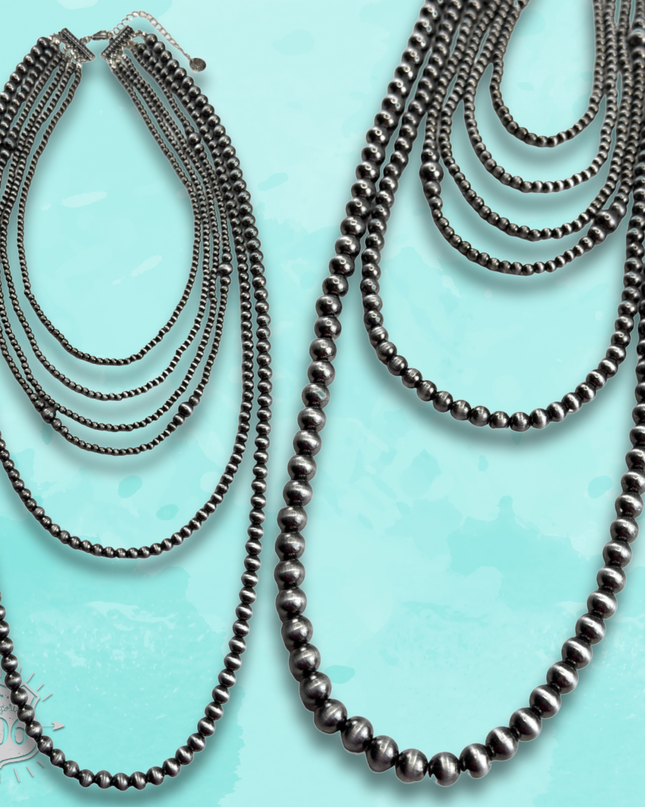 Western mixed size silver bead necklace