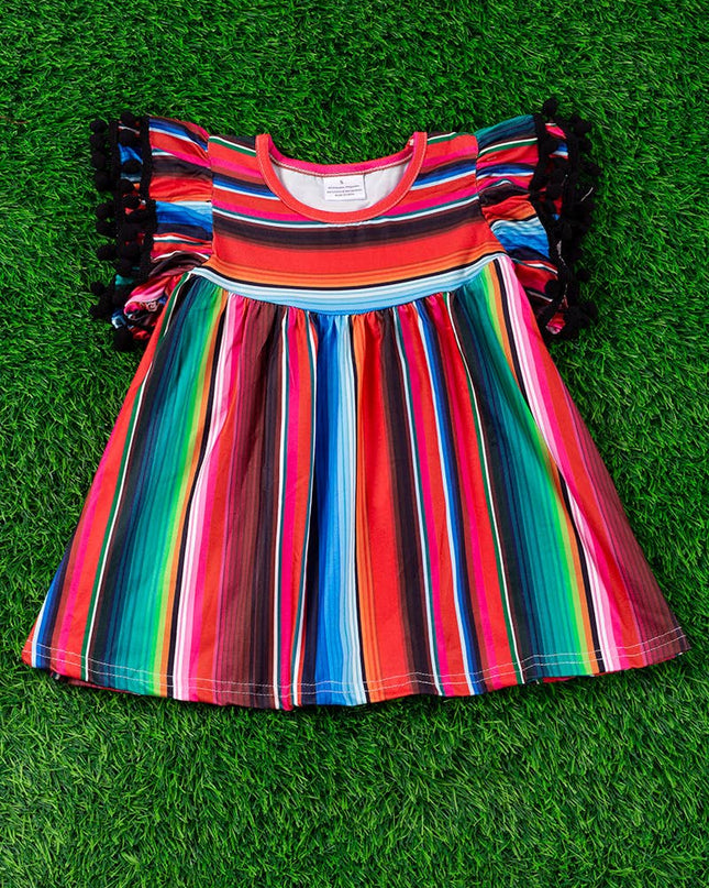 SERAPE PRINTED TUNIC WITH BLACK POM POM TRIM. TPG15113017-SO