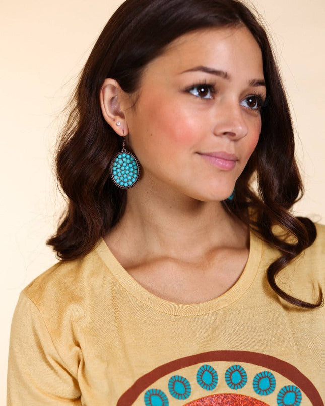 Bumpily Bamboozled Bronze Earrings With A Turquoise Pendant