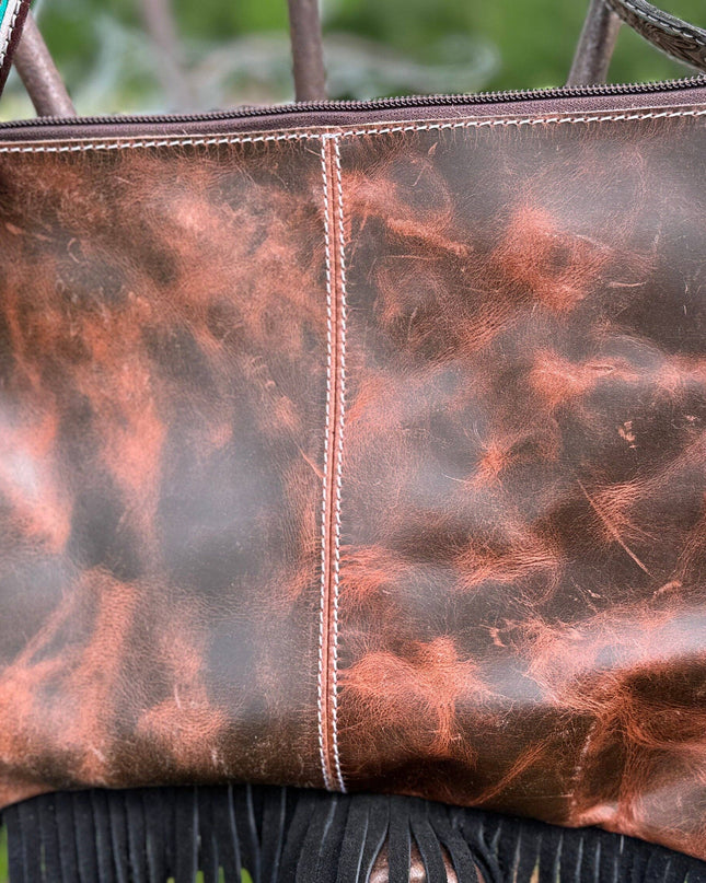 Genuine Western Cowhide Leather Purse and Wallet with jagged painted details and black fringe.