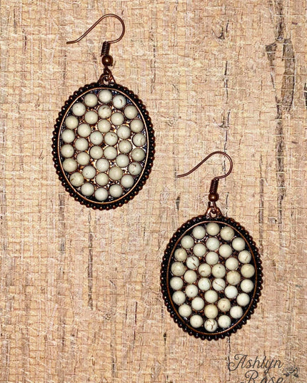 Bumpily Bamboozled Bronze Earrings With A Cream Pendant