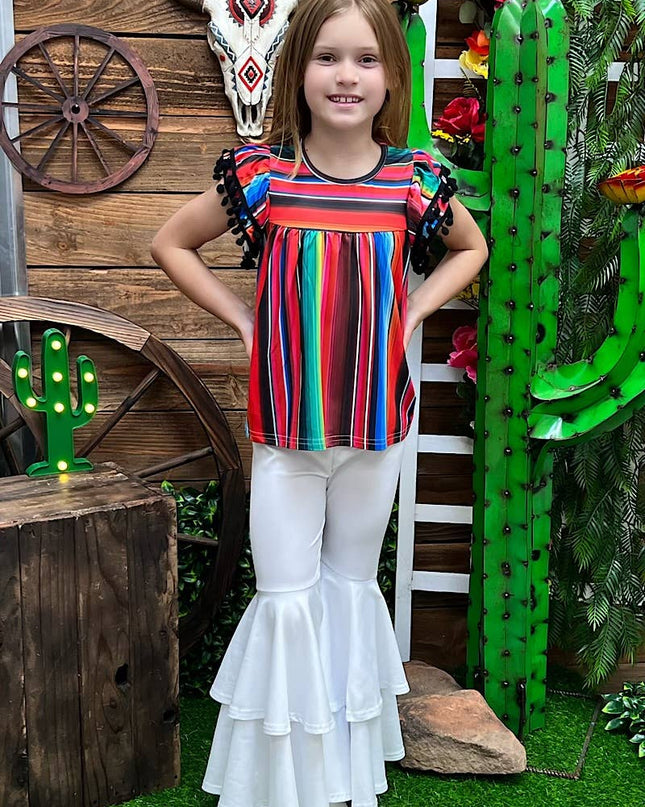 SERAPE PRINTED TUNIC WITH BLACK POM POM TRIM. TPG15113017-SO