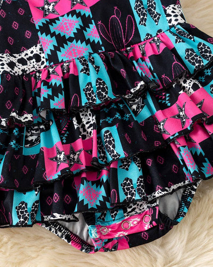 Black, fuchsia & turquoise aztec printed baby bodysuit. RPG60806 JEAN