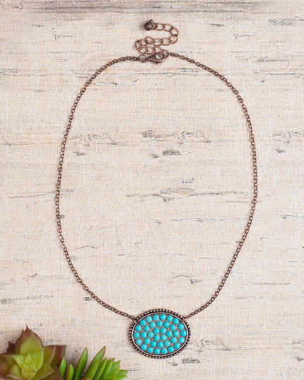 Bumpily Bamboozled Bronze Necklace With A Turquoise Pendant