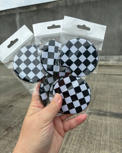 Checkered black and white car coasters